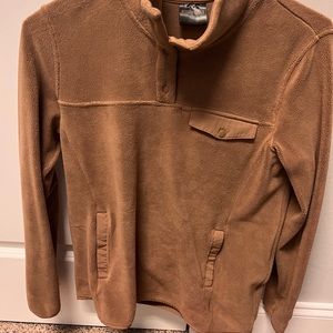 Warm fleece pullover, camel color with cute button accents.